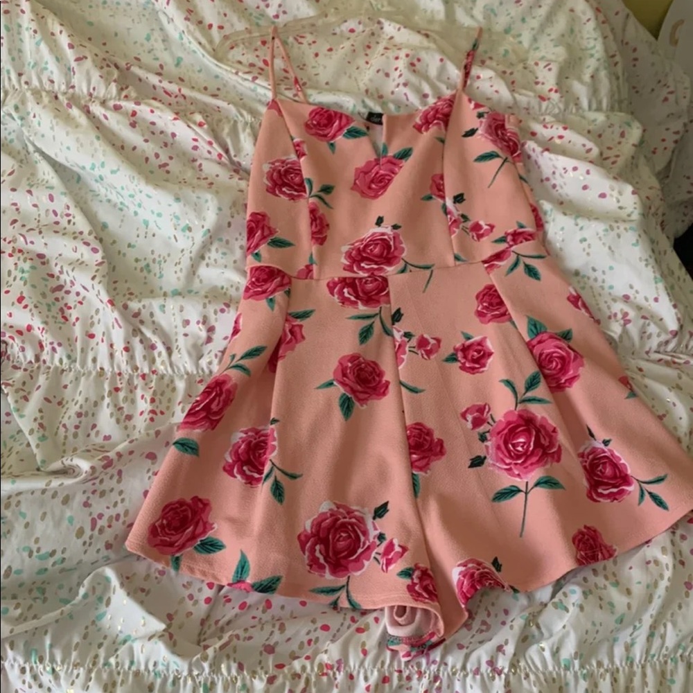 Pink romper with roses